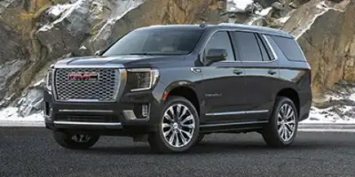 This pre-owned 2023 GMC Yukon Denali 4WD is finished in Midnight Blue Metallic with a Jet Black inte...