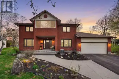Tucked in on a quiet street in Manotick and just steps from the Rideau River, this two-storey home o...