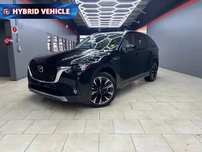 The 2024 Mazda CX-90 PHEV GT in a stunning black finish offers the perfect blend of luxurious style...
