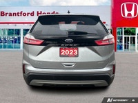 Command the road and embrace adventure in this sophisticated 2023 Ford Edge SEL, striking in Silver.... (image 4)