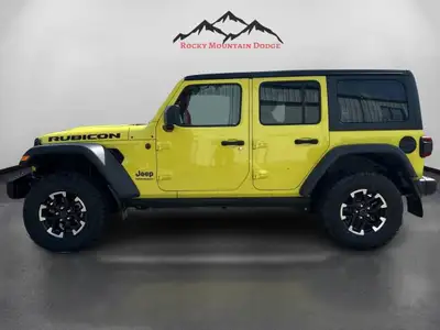 THIS VERY RARE VELOCITY YELLOW WRANGLER RUBICON WITH PLENTY OF OPTIONS INCLUDING 3.6L V6 PENTASTAR E...