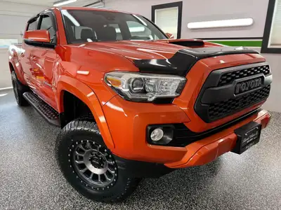 We have a LIFTED 2018 Toyota Tacoma TRD Sport 4x4! This truck looks and drives incredible! It comes...