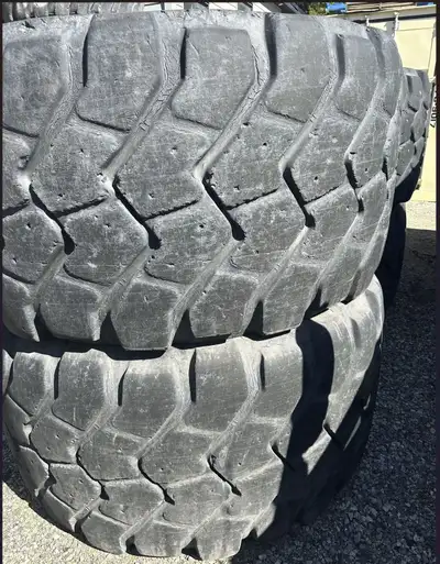 875/65R29 MICHELIN XAD65-1 tires (2) used Mounted on Volvo A40 rims (2) used See image for compatibi...