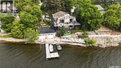 Welcome to 186 Pasqua Lake Road, a meticulously maintained and well-loved year-round waterfront retr...