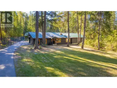 Parklike 2.54 country acres with 4 bedroom, 2 bathroom executive log home. Beautiful big stone firep...