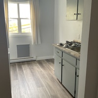 One bedroom apartment available now at $1,300/month. Rent includes: Stove, fridge, water and parking... (image 1)