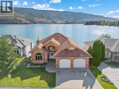 Waterfront Home with Private Dock in the Gated Community of Jade Bay. Experience lakeside living at...