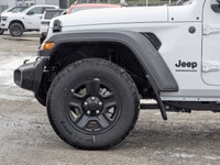 This Jeep Wrangler has a dependable Intercooled Turbo Premium Unleaded I-4 2.0 L/122 engine powering... (image 8)