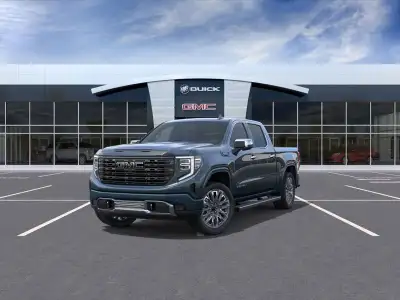 The 2026 GMC Sierra 1500 Denali Ultimate in a striking blue hue is a powerhouse on wheels with its 4...