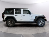 Introducing the stunning 2026 Jeep Wrangler Rubicon in a crisp white finish, delivering exceptional... (image 5)