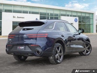 * 21-inch sport alloy wheels, dark-tinted radiator grille, unique front/rear bumpers, and large exha... (image 4)