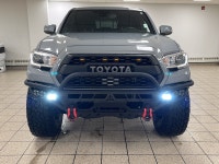 Built to outwork expectations and outplay the weekend, this 2021 Toyota Tacoma in Cement proves capa... (image 4)