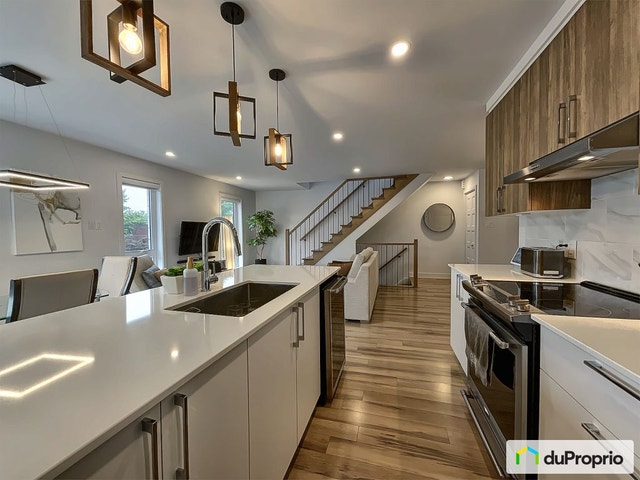 $535,000 - Condominium for sale in Laval-des-Rapides — photo 1