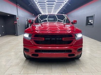 Introducing the 2022 Ram 1500 Sport, draped in a stunning red finish and powered by a robust 4x4 dri... (image 1)