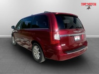 A spacious family minivan with comfortable seating, convenient features, and versatile cargo space,... (image 5)