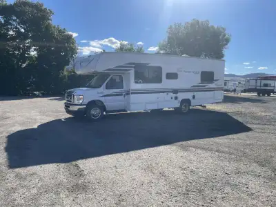 Coachmen Freelander Class C gas motorhome 27QB highlights: Rear Bedroom Bunk Over Cab 42in.in. x 71i...