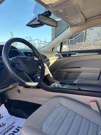 This 2020 Ford Fusion offers a perfect balance of style, comfort, and efficiency, making it an ideal... (image 6)