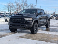 The 2026 Ram 1500 RHO Crew Cab in Diamond Black Crystal Pearl delivers bold styling and high-perform... (image 1)