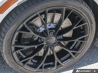 * Drivetrain: 4MOTION AWD with rear-axle torque vectoring. * Akrapovic Titanium Exhaust: Provides an... (image 8)