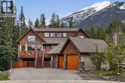 214 Eagle Point is an extraordinary mountain sanctuary perched on the sunny side of Canmore—where ti...