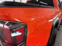 We have a RARE, SOLAR OCTANE 2023 Toyota Tacoma TRD PRO 4x4! This beast looks and drives incredible!... (image 8)