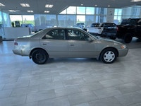 The 1998 Toyota Camry is a fuel-efficient midsize sedan known for its long-lasting durability, smoot... (image 4)
