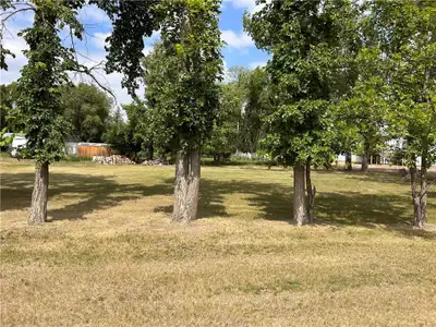 R34//Killarney/Private mature lot located at (404) North Railway has 136.12ft of frontage, paved roa...