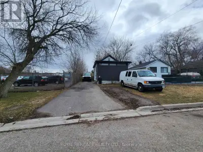 This bungalow is ideal for use as a tiny home or as a practical office space. The interior is though...