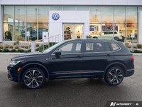 This Volkswagen Tiguan boasts a Intercooled Turbo Regular Unleaded I-4 2.0 L/121 engine powering thi... (image 1)