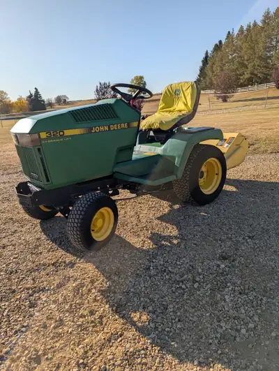 John Deere 320 with 30" rototiller, View more