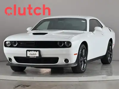 Auto Dimming Rearview Mirror, Front Heated Seats, Power Lumbar Support and more! Clutch is the large...