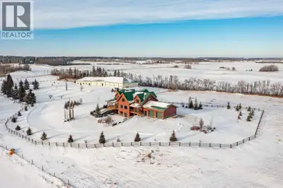 This exceptional 6.5-acre property offers a rare blend of architectural distinction, quality constru...