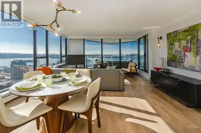 SKY-HIGH LUXURY IN LOWER LONSDALE! Perched on the 26th floor of the area's tallest tower, this nearl...