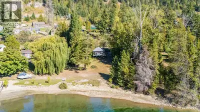Discover the potential in this rare waterfront opportunity just 8 minutes from Castlegar. With 156 f...