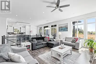 This exceptional 7-bedroom custom home, sits on a generous 9,000+ sqft lot. It boasts a legal 3-bedr...