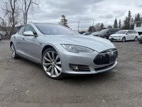 Experience the exceptional performance of the 2015 Tesla Model S P85D, a stunning silver AWD sedan r... (image 6)