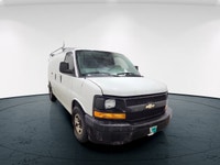 The 2017 Chevrolet Express Cargo Van in a classic white, rear-wheel drive design is tailored for tho... (image 3)