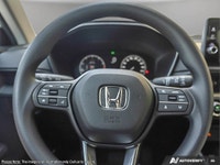 Introducing the 2026 Honda CR-V LX, a stunning black SUV that combines the sophistication of a moder... (image 8)