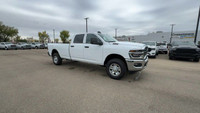 This 2025 RAM 2500 TRADESMAN CREW CAB 4X4 has the following options Hd Vinyl 40/20/40 Split Bench Se... (image 6)