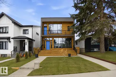 This gorgeous, contemporary Canmore-styled home is stunning in every way! The exterior features a la...