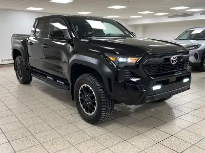 Engineered for drivers who want capability without compromising conscience, this 2025 Toyota Tacoma...