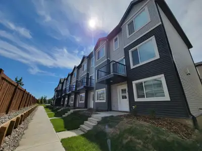 Spectactular 2 bedroom, 1 bathroom townhouse with a single attached garage in NE Edmonton! Welcome h...