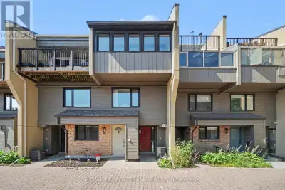 Unique, bright and spacious loft-style 1.5-bathroom with separate den/sun room condo townhome offers...