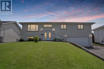 New Listing. Located on A Supersized Lot, This Impressive Open Concept Bi-Level Home Offers The Perf...
