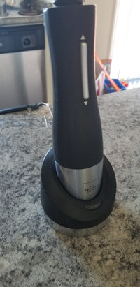 Sharper image electrical wine bottle opener