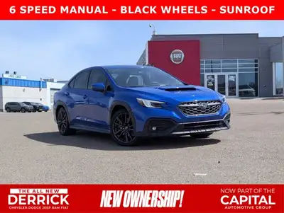 The pre-owned 2023 Subaru WRX Sport-Tech in WR Blue Pearl with a Black Alcantara interior delivers e...