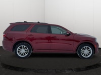 Experience the ultimate fusion of muscle-car attitude and three-row utility in this aggressive SUV,... (image 5)