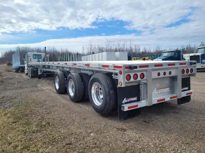 53’ Full Aluminum Flat deck. Aluminum floor wit 3 wood nailer stripes. 21 Sliding and 3 fixed winche...