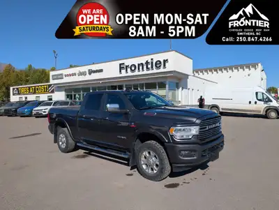 The 2022 Ram 3500 Laramie Crew Cab 4x4 in Granite Crystal Metallic combines serious heavy-duty diese...