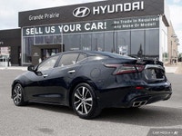 Experience effortless power and sophisticated style behind the wheel of this 2022 Nissan Maxima SL.... (image 3)